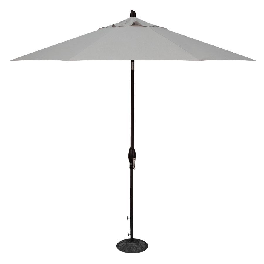Beige patio umbrella with black pole on a white background
