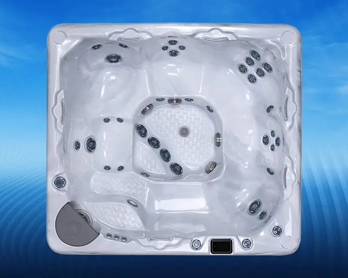 top down view of a beachcomber 720 hot tub on a blue background