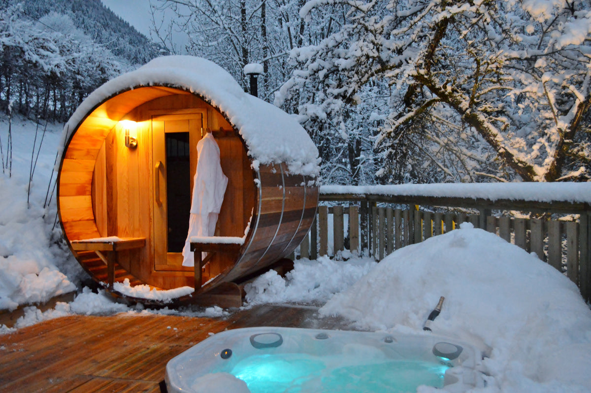 Winter backyard wellness setup with wood burning sauna